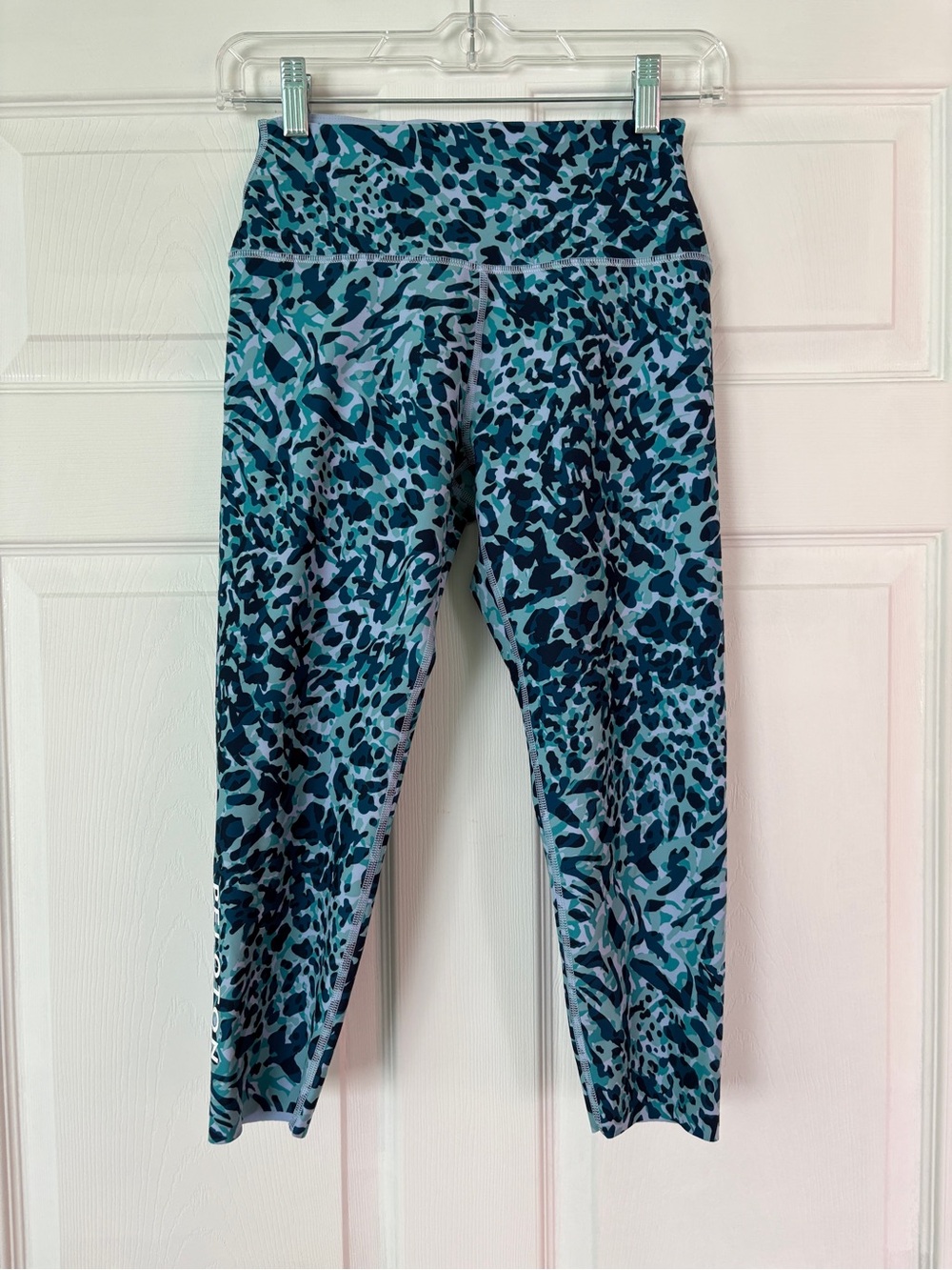 Peloton Teal Leopard Print Capri Leggings
